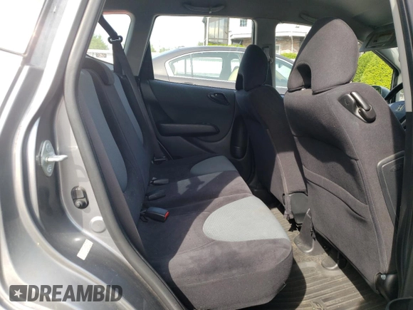 2007 Honda Fit Sport z VIN JHMGD37677S001013, wystawiony jako Copart lot #58792605 z przebiegiem 157 960 mil mil oraz Czysty tytuł • Clean title. Historia ofert i sprzedaży dostępna na DreamBid. Obrazek 10.