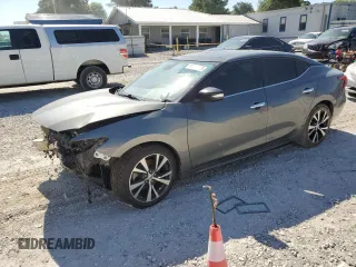 2017 Nissan Maxima Platinum with VIN 1N4AA6AP4HC382646, listed as a Copart auction lot 65991445 with 74,418 mi miles and Salvage title. Bid and sale history available at DreamBid. Image 1.