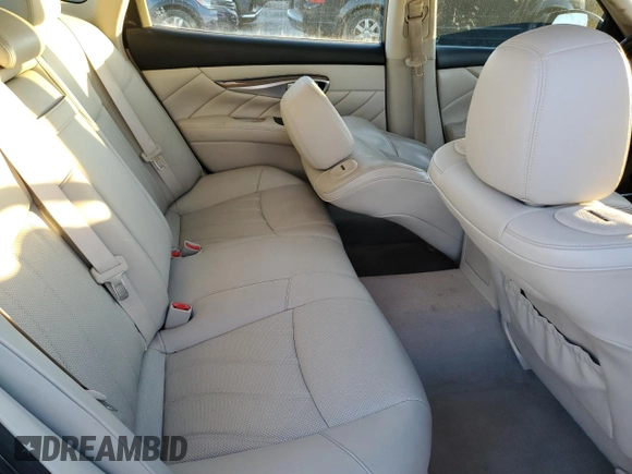 2015 Infiniti Q70 z VIN JN1BY1PR2FM830124, wystawiony jako Copart lot #42536205 z przebiegiem 138 498 mil mil oraz Szkoda całkowita • Salvage title. Historia ofert i sprzedaży dostępna na DreamBid. Obrazek 10.