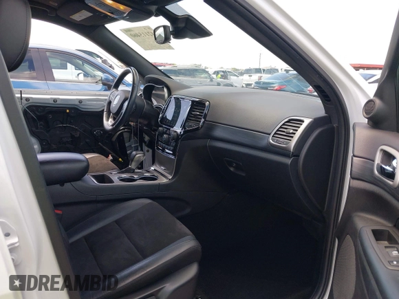 2021 Jeep Grand Cherokee Laredo E with VIN 1C4RJEAG2MC785168, listed as a IAAI auction lot 42115460 with 64,036 mi miles and . Bid and sale history available at DreamBid. Image 5.