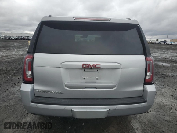 2015 GMC Yukon XL SLT with VIN 1GKS2HKC8FR616031, listed as a Copart auction lot 48740785 with 128,467 mi miles and Salvage Title. Bid and sale history available at carsss.com. Image 6.