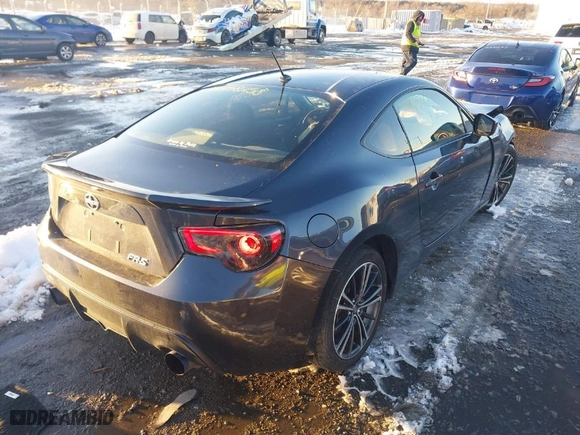 2014 Scion FR-S with VIN JF1ZNAA10E8700881, listed as a IAAI auction lot 41258258 with 202803 miles. Bid and sale history available at carsss.com. Image 4.