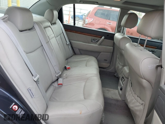 2005 Kia Amanti z VIN KNALD124055055725, wystawiony jako Copart lot #73573754 z przebiegiem 105 665 mil mil oraz Tytuł czysty. Historia ofert i sprzedaży dostępna na DreamBid. Obrazek 10.