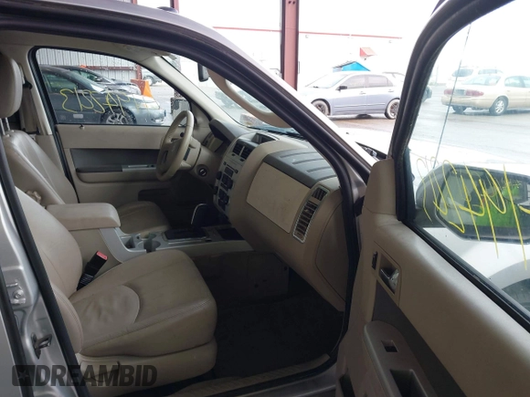 2011 Mercury Mariner Premier with VIN 4M2CN9HG3BKJ08263, listed as a IAAI auction lot 41942213 with 181,041 mi miles and . Bid and sale history available at DreamBid. Image 5.