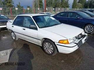 1993 Ford Escort z VIN 3FAPP13J9PR205353, wystawiony jako IAAI lot #41837169 z przebiegiem 4016 mil mil oraz . Historia ofert i sprzedaży dostępna na DreamBid. Obrazek 1.