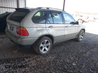 2001 BMW X5 3.0i with VIN WBAFA53591LH79412, listed as a IAAI auction lot 41410946 with 186,315 mi miles. Bid and sale history available at carsss.com. Image 4.