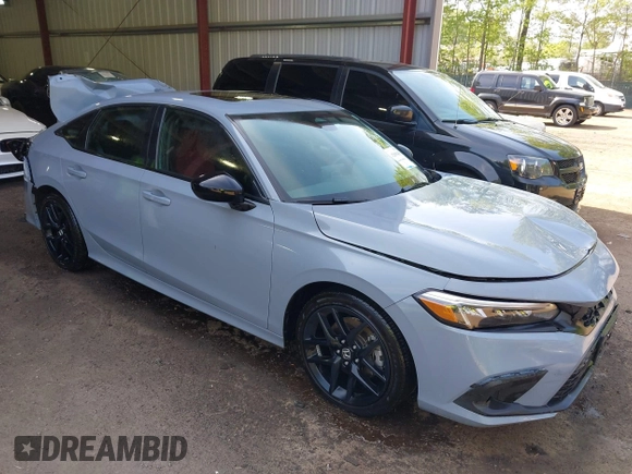 2022 Honda Civic Si with VIN 2HGFE1E52NH474042, listed as a IAAI auction lot 42099415 with 26,828 mi miles and . Bid and sale history available at DreamBid. Image 1.
