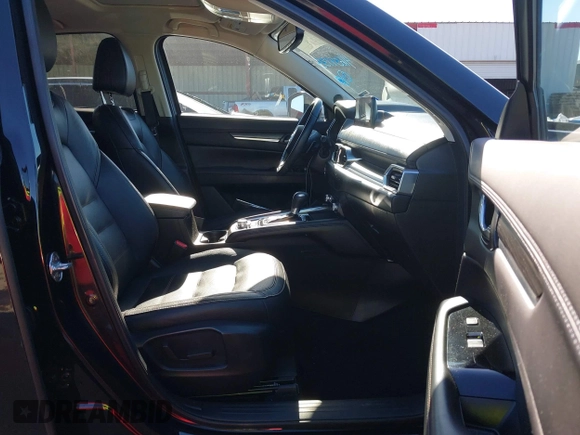 2021 Mazda CX-5 Grand Touring with VIN JM3KFADM1M0406098, listed as a IAAI auction lot 41654735 with 33,050 mi miles. Bid and sale history available at carsss.com. Image 5.
