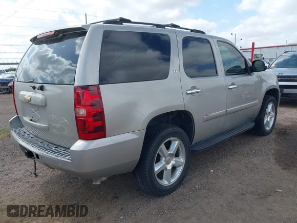 2007 Chevrolet Tahoe LT with VIN 1GNFC13047R176064, listed as a IAAI auction lot 42507367 with 245,075 mi miles and . Bid and sale history available at DreamBid. Image 4.