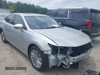 2014 Lexus ES 330 with VIN JTHBK1GG2E2134935, listed as a IAAI auction lot 42430419 with 99,124 mi miles and . Bid and sale history available at DreamBid. Image 1.