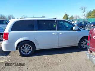 2019 Dodge Grand Caravan SXT with VIN 2C4RDGCG3KR752667, listed as a IAAI auction lot 41685273 with 171,352 mi miles and . Bid and sale history available at DreamBid. Image 13.