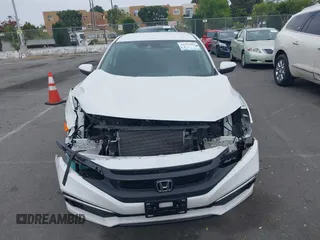 2020 Honda Civic LX z VIN 19XFC2F67LE212561, wystawiony jako IAAI lot #42272481 z przebiegiem 50 681 mil mil oraz . Historia ofert i sprzedaży dostępna na DreamBid. Obrazek 13.