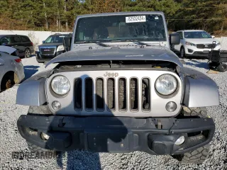 2018 Jeep Wrangler JK Unlimited Sport S with VIN 1C4BJWDG2JL871448, listed as a Copart auction lot 82932434 with 125,144 mi miles and Clean Title. Bid and sale history available at carsss.com. Image 5.