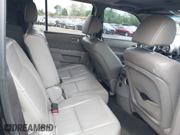 2012 Honda Pilot EX-L with VIN 5FNYF4H52CB068007, listed as a IAAI auction lot 42184390 with 137,126 mi miles and . Bid and sale history available at DreamBid. Image 8.