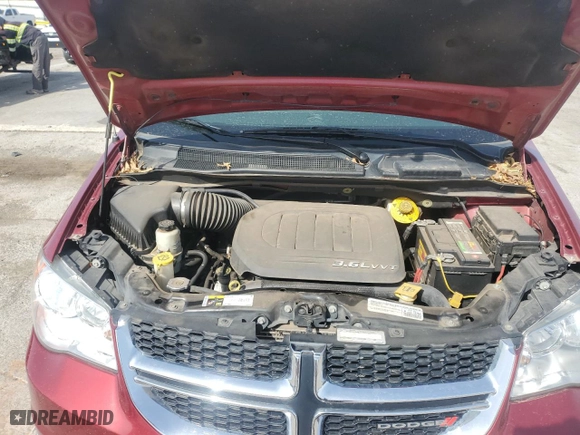2015 Dodge Grand Caravan American Value Pkg with VIN 2C4RDGBG2FR615727, listed as a Copart auction lot 51676455 with 106,667 mi miles and Salvage Title. Bid and sale history available at carsss.com. Image 12.