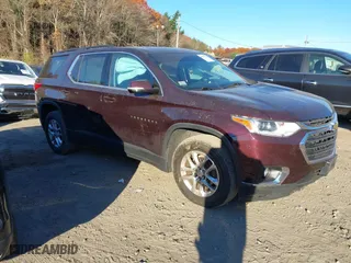 2019 Chevrolet Traverse LT Cloth with VIN 1GNEVGKW0KJ103392, listed as a IAAI auction lot 40702731 with 77,025 mi miles. Bid and sale history available at carsss.com. Image 1.