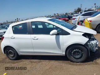 2015 Toyota Yaris L with VIN VNKKTUD37FA041957, listed as a IAAI auction lot 42106508 with 104,496 mi miles and . Bid and sale history available at DreamBid. Image 14.