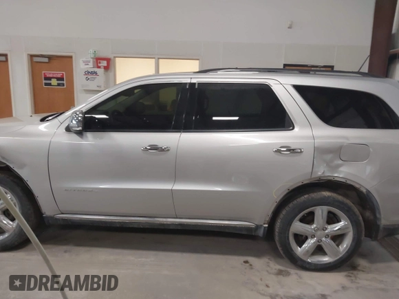 2011 Dodge Durango Citadel with VIN 1D4RE5GG0BC613829, listed as a IAAI auction lot 41770523 with 161,200 mi miles and . Bid and sale history available at DreamBid. Image 14.