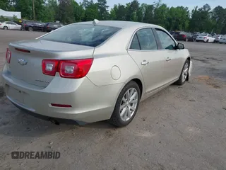 2013 Chevrolet Malibu LTZ with VIN 1G11H5SA5DF259174, listed as a IAAI auction lot 42145891 with 158,959 mi miles and . Bid and sale history available at DreamBid. Image 4.
