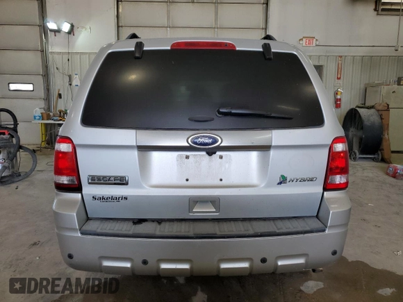 2012 Ford Escape Hybrid with VIN 1FMCU5K37CKB42310, listed as a Copart auction lot 67651144 with 154,852 mi miles and Salvage title. Bid and sale history available at DreamBid. Image 6.