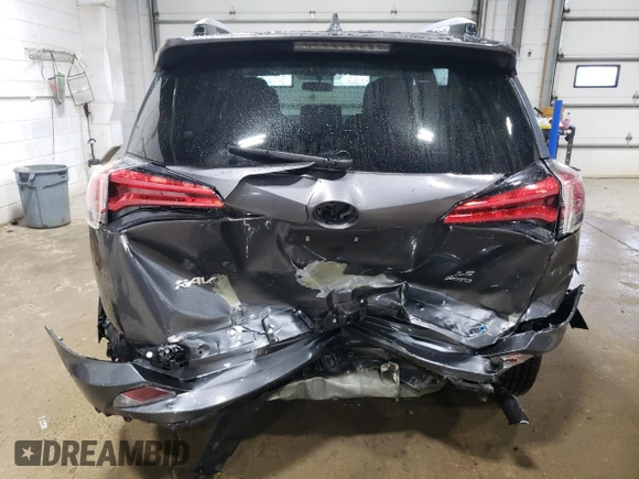 2016 Toyota RAV4 LE with VIN JTMBFREV3GD195188, listed as a Copart auction lot 52217295 with 113,808 mi miles and Salvage Title. Bid and sale history available at DreamBid. Image 6.