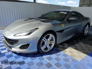 2021 Ferrari Portofino z VIN ZFF89FPA0M0259248, wystawiony jako Copart lot #43380195 z przebiegiem 6175 mil mil oraz Nie do naprawy. Historia ofert i sprzedaży dostępna na DreamBid. Obrazek 1.