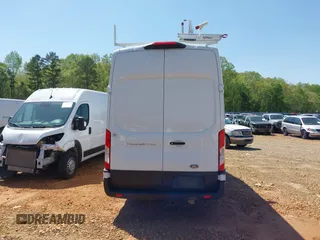 2021 Ford Transit Cargo z VIN 1FTBW3X88MKA42155, wystawiony jako IAAI lot #41988889 z przebiegiem 74 643 mil mil oraz . Historia ofert i sprzedaży dostępna na DreamBid. Obrazek 17.