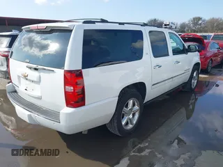 2010 Chevrolet Suburban LTZ with VIN 1GNUKKE34AR189475, listed as a IAAI auction lot 41179252 with 127,132 mi miles. Bid and sale history available at carsss.com. Image 4.