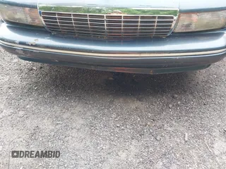 1996 Chevrolet Caprice 1SA Special Value z VIN 1G1BL52W6TR174680, wystawiony jako IAAI lot #42157291 z przebiegiem Nie podano mil oraz . Historia ofert i sprzedaży dostępna na DreamBid. Obrazek 6.