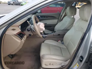 2014 Cadillac CTS Luxury AWD with VIN 1G6AX5S3XE0178755, listed as a Copart auction lot 77660094 with 82,325 mi miles and Salvage Title. Bid and sale history available at DreamBid. Image 7.