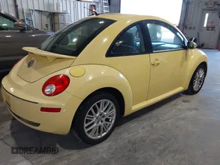 2007 Volkswagen New Beetle Coupe with VIN 3VWRW31C77M518367, listed as a IAAI auction lot 41488953 with 202,950 mi miles. Bid and sale history available at carsss.com. Image 4.