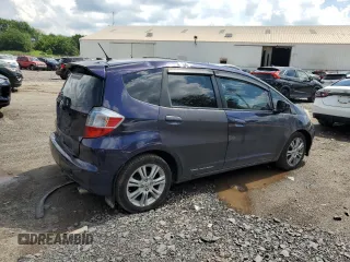 2010 Honda Fit Sport with VIN JHMGE8H44AC013385, listed as a Copart auction lot 63216515 with 228,358 mi miles and Salvage title. Bid and sale history available at DreamBid. Image 3.