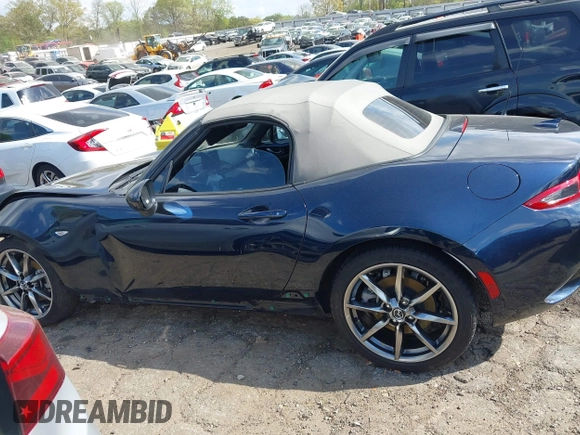 2021 Mazda MX-5 Miata Grand Touring с VIN JM1NDAD79M0457032, выставлен на аукционе IAAI как лот 41931348 с пробегом 47 874 миль миль и . История ставок и продаж доступна на DreamBid. Изображение 14.