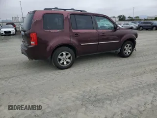 2011 Honda Pilot Touring z VIN 5FNYF3H92BB039165, wystawiony jako Copart lot #59596105 z przebiegiem 182 944 mil mil oraz Szkoda całkowita • Salvage title. Historia ofert i sprzedaży dostępna na DreamBid. Obrazek 3.