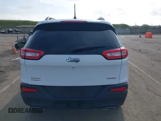 2016 Jeep Cherokee Latitude with VIN 1C4PJMCS1GW185442, listed as a IAAI auction lot 42033699 with 123,306 mi miles. Bid and sale history available at carsss.com. Image 16.