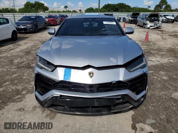 2021 Lamborghini Urus z VIN ZPBUA1ZL5MLA11591, wystawiony jako Copart lot #71260894 z przebiegiem Nie podano mil oraz Tytuł czysty. Historia ofert i sprzedaży dostępna na DreamBid. Obrazek 5.