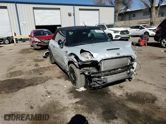 2012 MINI Convertible S z VIN WMWZP3C58CT550106, wystawiony jako Copart lot #45629035 z przebiegiem 104 851 mil mil oraz Szkoda całkowita • Salvage title. Historia ofert i sprzedaży dostępna na DreamBid. Obrazek 11.