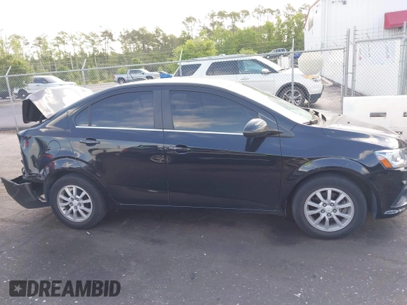 2020 Chevrolet Sonic LT z VIN 1G1JD5SB5L4106602, wystawiony jako IAAI lot #42159240 z przebiegiem 74 339 mil mil oraz . Historia ofert i sprzedaży dostępna na DreamBid. Obrazek 13.