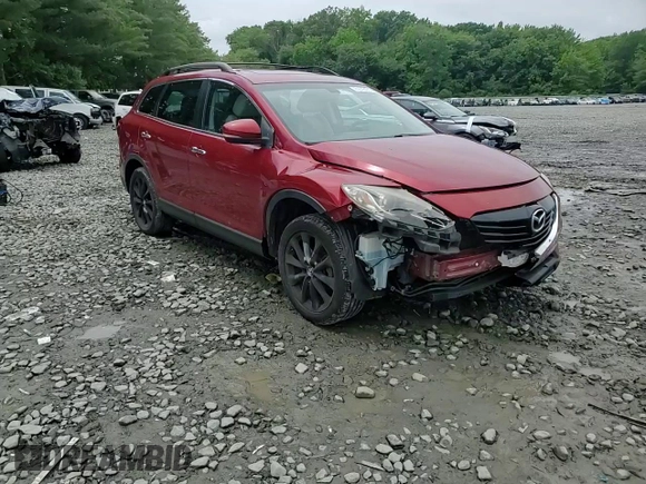 2015 Mazda CX-9 Grand Touring z VIN JM3TB3DV0F0461438, wystawiony jako Copart lot #61615275 z przebiegiem 212 252 mil mil oraz Szkoda całkowita • Salvage title. Historia ofert i sprzedaży dostępna na DreamBid. Obrazek 14.