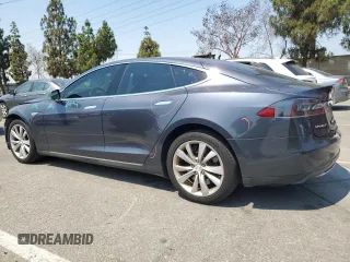 2014 Tesla Model S 60 z VIN 5YJSA1H11EFP64764, wystawiony jako Copart lot #64265815 z przebiegiem 126 191 mil mil oraz Szkoda całkowita • Salvage title. Historia ofert i sprzedaży dostępna na DreamBid. Obrazek 2.