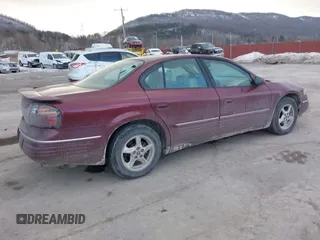 2001 Pontiac Bonneville SE z VIN 1G2HX54K914293726, wystawiony jako IAAI lot #41373612 z przebiegiem 120 117 mil mil oraz . Historia ofert i sprzedaży dostępna na DreamBid. Obrazek 4.