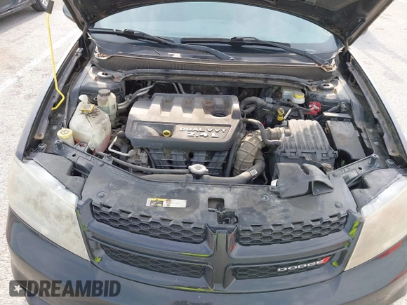 2014 Dodge Avenger SE with VIN 1C3CDZAB6EN155429, listed as a IAAI auction lot 42773351 with 156,482 mi miles and . Bid and sale history available at DreamBid. Image 10.
