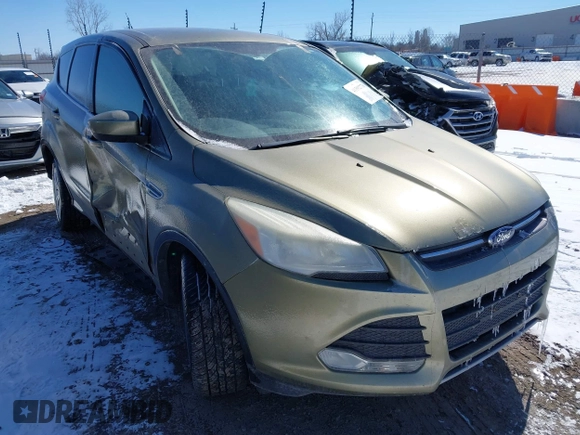 2013 Ford Escape SE with VIN 1FMCU0GX4DUC60741, listed as a IAAI auction lot 41592770 with 121,972 mi miles and . Bid and sale history available at DreamBid. Image 1.