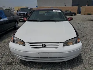 1999 Toyota Camry LE z VIN JT2BF22K8X0181675, wystawiony jako Copart lot #55057875 z przebiegiem 184 657 mil mil oraz Szkoda całkowita • Salvage title. Historia ofert i sprzedaży dostępna na DreamBid. Obrazek 5.