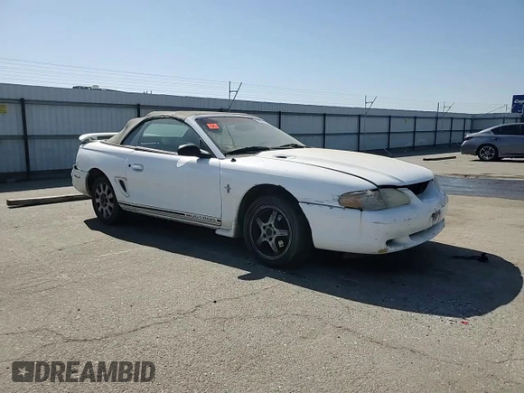 1998 Ford Mustang with VIN 1FAFP4448WF269580, listed as a Copart auction lot 54861155 with 304,869 mi miles and Salvage title. Bid and sale history available at DreamBid. Image 13.