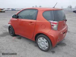 2012 Scion iQ with VIN JTNJJXB03CJ021023, listed as a IAAI auction lot 41487646 with 143,735 mi miles. Bid and sale history available at carsss.com. Image 3.