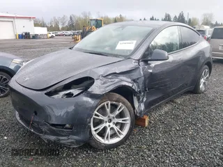 2023 Tesla Model Y Long Range with VIN 7SAYGAEE4PF871281, listed as a IAAI auction lot 41989805 with 15,501 mi miles. Bid and sale history available at carsss.com. Image 21.