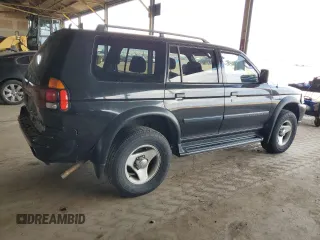 2001 Mitsubishi Montero ES z VIN JA4LS21H11P003533, wystawiony jako Copart lot #54403045 z przebiegiem 241 477 mil mil oraz Szkoda całkowita • Salvage title. Historia ofert i sprzedaży dostępna na DreamBid. Obrazek 3.