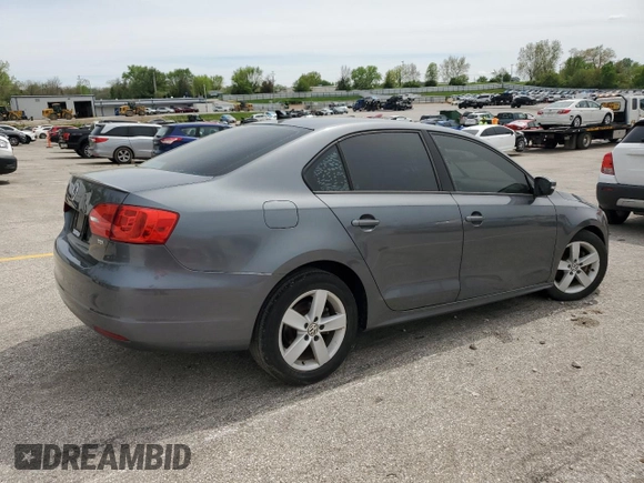 2012 Volkswagen Jetta TDI w/Premium & Nav z VIN 3VWLL7AJ8CM319746, wystawiony jako Copart lot #54313335 z przebiegiem 186 003 mil mil oraz Czysty tytuł • Clean title. Historia ofert i sprzedaży dostępna na DreamBid. Obrazek 3.