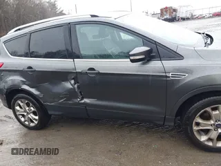 2015 Ford Escape Titanium with VIN 1FMCU9JX6FUB79093, listed as a IAAI auction lot 41805057 with 87,788 mi miles. Bid and sale history available at carsss.com. Image 13.
